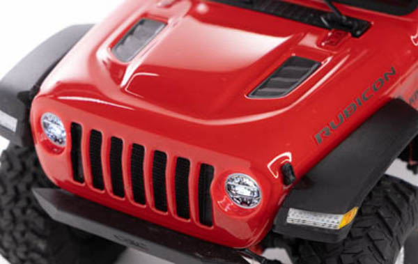 HIGHLY DETAILED LEXAN® BODY WITH INJECTION-MOLDED FEATURES