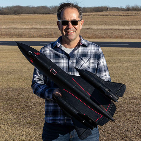 Man holding E-Flite SR-71 Blackbird