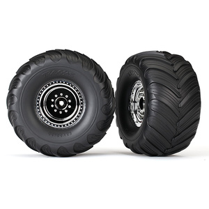 TRAXXAS 3665X: Tires & wheels, assembled, glued (chrome wheels, Terra Groove dual profile tires) (nitro r/ electric f) (2)